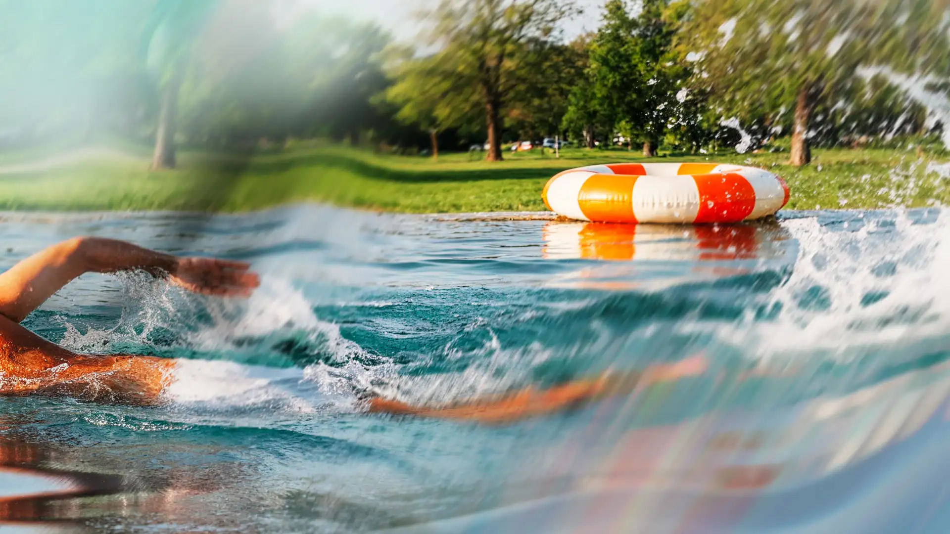 Schwimmer im Freibad Mirador mit Blick auf die Liegewiese in Krems