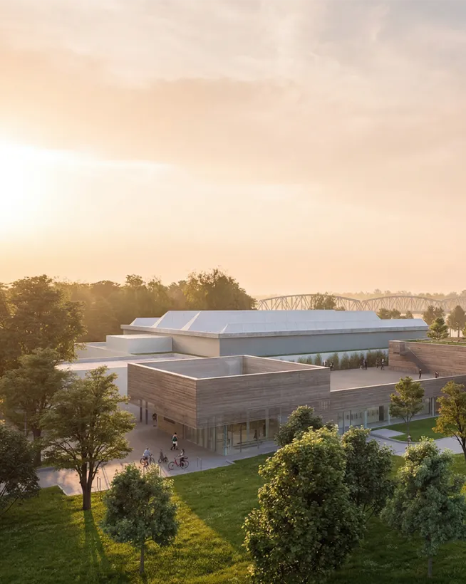 Eingangsbereich des Mirador in Krems mit moderner Architektur und Radständern