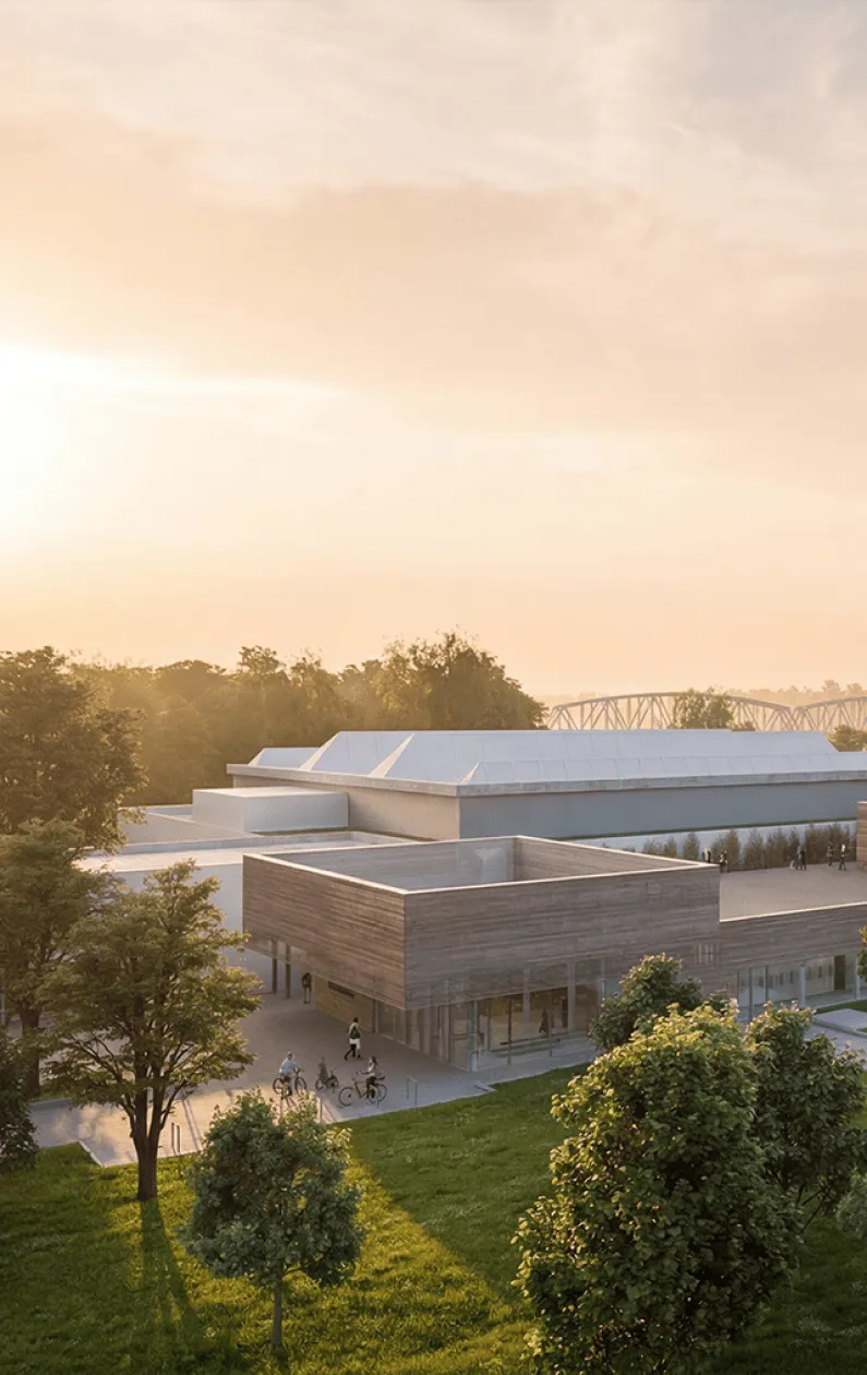 Eingangsbereich des Mirador in Krems mit moderner Architektur und Radständern